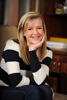 Teen with braces smiling